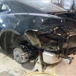 Photographs of a 2014 Chevrolet Camaro that was in an accident and repaired by Elite Paint & Body Shop in West Palm Beach Florida